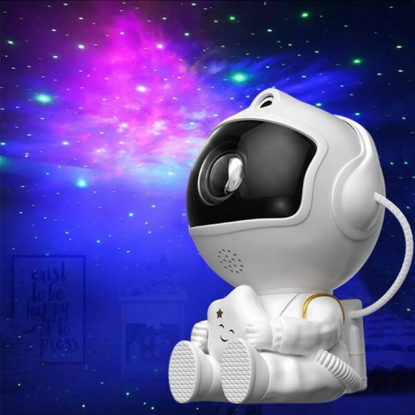 A cute astronaut-themed night light designed for children, featuring a space robot with colorful LED lights projecting starry patterns on the wall.