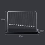 Classic Newton's Cradle with 8 metal balls on a black base, demonstrating physics principles of momentum and energy transfer, ideal for science education and decor.