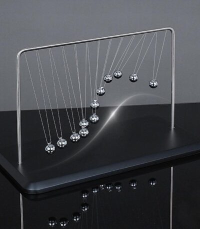 Classic Newton's Cradle with metal balls demonstrating conservation of momentum and energy, perfect for science classrooms and educational displays.