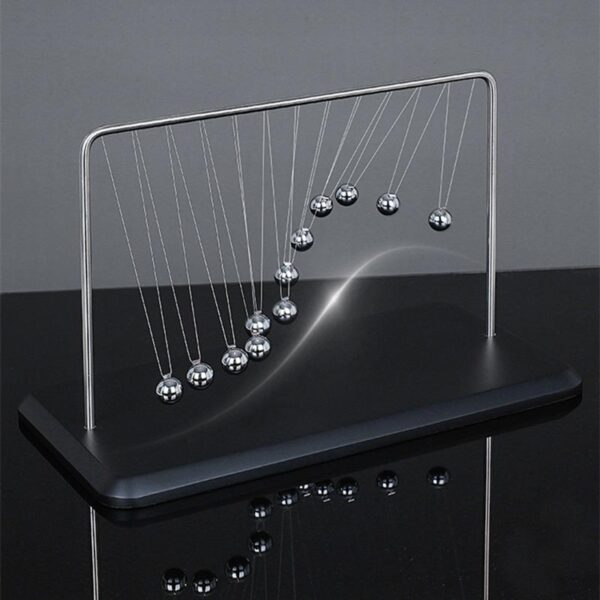 Classic Newton's Cradle with metal balls demonstrating conservation of momentum and energy, perfect for science classrooms and educational displays.