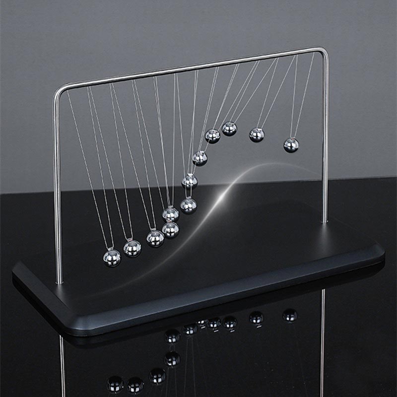 Classic Newton's Cradle with metal balls demonstrating conservation of momentum and energy, perfect for science classrooms and educational displays.