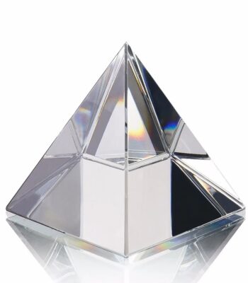 Clear pyramid-shaped optical prism used in science experiments to demonstrate light refraction and dispersion. Perfect for educational and scientific demonstrations.