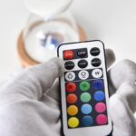 Remote control with multiple color options and lighting modes for scientific demonstrations and decorative lighting projects.