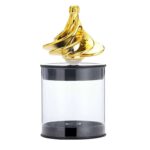 Gold wind spinner shaped like a banana, designed for decorative and educational purposes, perfect for science decor and interactive learning displays.