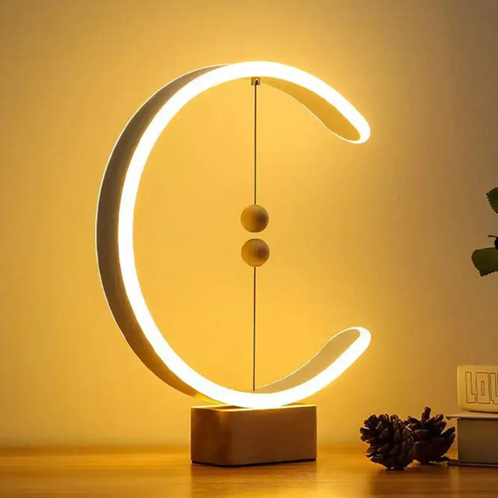 Stylish moon phase LED lamp with warm lighting, perfect for home decor or as an educational night light for children.