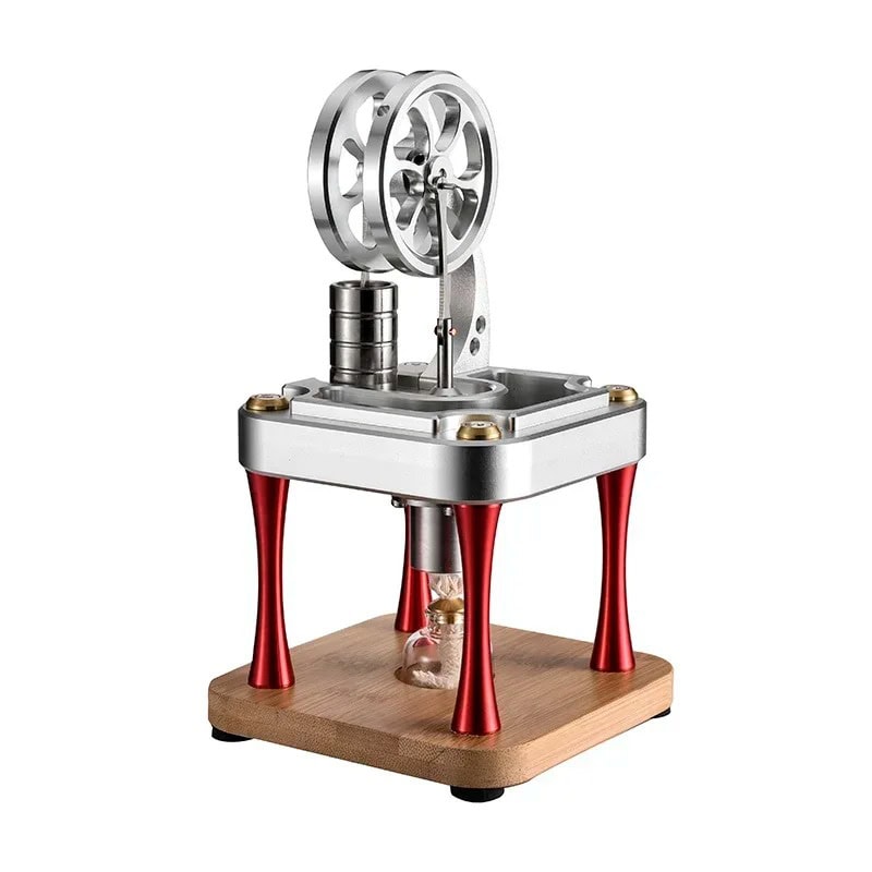 Magnetic Stirling Engine Model Small desktop magnetic Stirling engine model demonstrating thermodynamic principles with metal and wooden components.