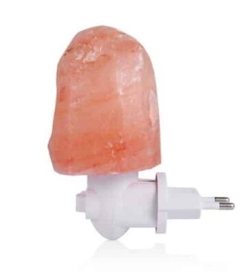 Salt lamp night light with Himalayan salt crystal and white plug-in base. Perfect for creating a relaxing ambiance and adding a natural decorative touch to any room.