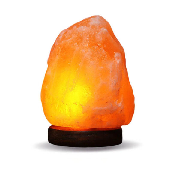 Himalayan salt lamp emitting warm orange glow on a black wooden base, ideal for home decor and creating a relaxing atmosphere.