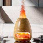 Colorful lava lamp with glowing melts and simulated smoke rising from the top, creating a mesmerizing visual display.