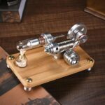 A miniature Stirling engine model powered by a light bulb, demonstrating thermodynamic principles in a compact, educational design.