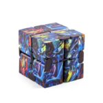 A vibrant, multicolored Rubik's Cube puzzle toy with a swirling, marbled design, perfect for brain teasers, educational activities, and stimulating cognitive skills.