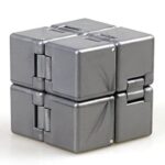 A metallic magnetic puzzle cube with interlocking pieces, showcasing a sleek silver finish and intricate design for educational and brain-teasing fun.