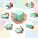 Hand holding a light blue twisty puzzle cube with yellow accents, demonstrating its flexible, modular design for brain teasers and educational activities.
