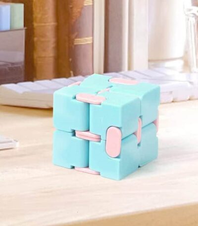 A pastel blue and pink 3D puzzle cube with interlocking pieces, designed for educational and recreational use, perfect for science and STEM learning activities.