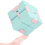 Innovative 3D puzzle cube with pastel blue and pink pieces, designed to challenge spatial reasoning and problem-solving skills. Perfect for science enthusiasts and educational toy collectors.