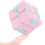 Pink and blue modular cube puzzle with interlocking pieces, designed for educational and brain-teasing fun, perfect for science enthusiasts and puzzle lovers.