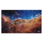 A detailed image of a colorful nebula showcasing vibrant orange, blue, and purple hues against a starry background.