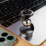 Wireless ring scanner device for smartphones and tablets, designed for easy scanning and data entry. Compact, ergonomic, and compatible with various mobile devices for efficient workflow.