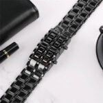 Stylish black metal watch band suitable for men and women, featuring a sleek and modern design with durable links. Perfect for everyday wear or special occasions.
