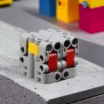 Robotic LEGO-style construction toy with colorful interlocking pieces for STEM learning.