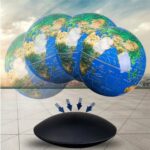 Interactive globe with a wireless charging pad, showcasing Earth's continents and oceans, ideal for educational and decorative purposes.