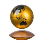 Decorative gold-colored globe model showing continents and countries, mounted on a sleek base, ideal for educational and decorative purposes.