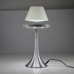 LED desk lamp with a sleek white shade and a shiny silver base, ideal for modern home or office decor.