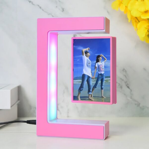 Modern pink LED mirror with digital display, perfect for beauty and skincare routines, featuring bright lighting and sleek design.