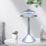 UFO-shaped lamp with blue light, perfect for science-themed decor and educational purposes. Modern design with a sleek metallic finish, ideal for science classrooms or home science setups.