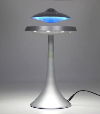 Modern UFO-shaped LED desk lamp emitting blue light, ideal for science decor and educational spaces.