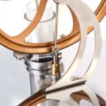 Elegant scientific instrument with metallic and wooden components, showcasing a modern design for science enthusiasts.