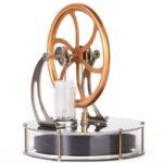 Educational heat engine model demonstrating thermodynamics principles with a rotating wheel, glass container, and metal components for science learning.