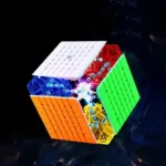 Close-up of a Rubik's Cube with visible internal gears and colorful parts, showcasing a blend of puzzle and mechanical design on a dark background.