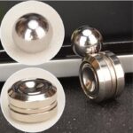 Set of shiny metallic magnetic balls and bearings for science experiments and educational demonstrations. Perfect for physics projects and magnetic field studies.