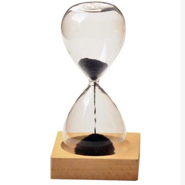 Classic sand timer with black sand flowing between glass bulbs, mounted on a wooden base, ideal for educational and decorative purposes.