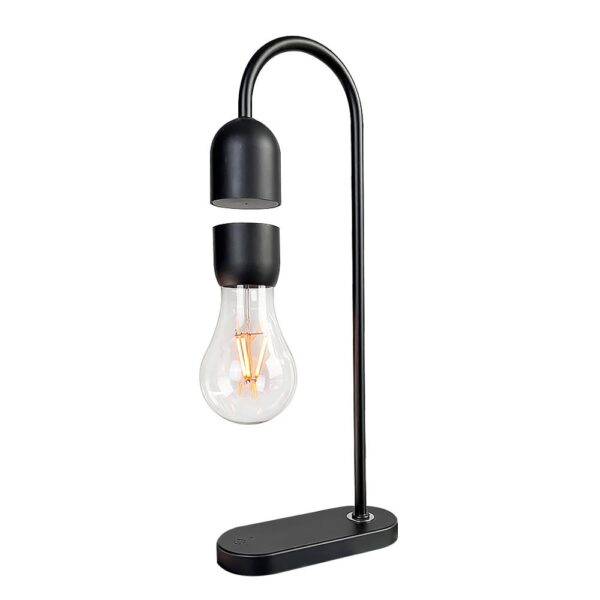 A modern desk lamp featuring an exposed Edison-style filament bulb and a sleek black metal stand, perfect for science-inspired decor and educational settings.