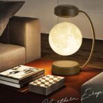 A stylish moon-shaped lamp illuminating a cozy living space, placed on a wooden table alongside books and a chessboard. The lamp adds a celestial touch to contemporary home decor.