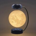 Realistic moon lamp with a detailed lunar surface design, mounted on a sleek black stand with a flexible arm, creating a cozy and educational moonlight display.
