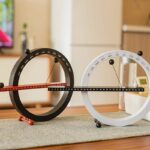 Innovative science gadgets for home decor and educational purposes, featuring unique designs like circular calendars and kinetic models. Perfect for science enthusiasts and learners.