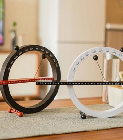 Innovative science gadgets for home decor and educational purposes, featuring unique designs like circular calendars and kinetic models. Perfect for science enthusiasts and learners.