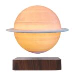 Decorative Saturn planet lamp with ring, educational science decor for home or classroom, illuminated model of Saturn for science enthusiasts and students.
