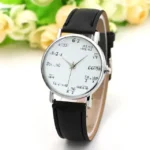 A stylish wristwatch featuring a white dial with various mathematical equations and formulas instead of traditional numbers, paired with a black leather strap.