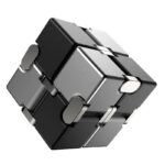 A metallic magnetic puzzle cube with interlocking pieces, showcasing a modern and innovative design for educational and science-themed decor.