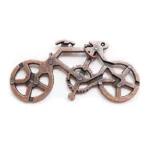 Metal bike gear puzzle with interconnected gears and frame, showcasing intricate mechanical design.