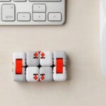 Innovative mechanical puzzle cube with interlocking pieces designed for brain teasers, educational activities, and cognitive development. Compact and colorful, perfect for science and learning enthusi.
