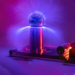 A magnetic plasma ball displaying colorful electric discharges and glowing effects, creating a captivating visual of science and energy.