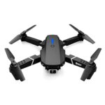 Compact black drone with four propellers and built-in camera, ideal for aerial photography and videography enthusiasts.