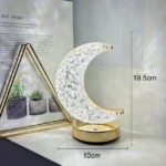Moon-shaped crystal LED lamp with gold base, 19.5cm tall, 10cm wide, perfect for bedroom or living room decor.