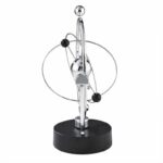 A magnetic orbital model demonstrating atomic structure with metal spheres and rings on a black base, used for science education and decor.