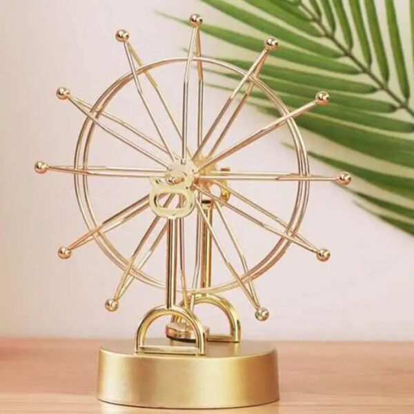 Elegant gold Ferris wheel desk ornament with intricate design, perfect for science decor and educational display.